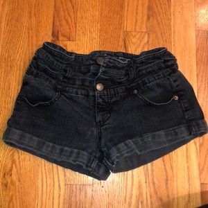 Black denim shorts.